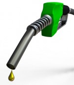 Green fuel nozzle with golden droplet on white background